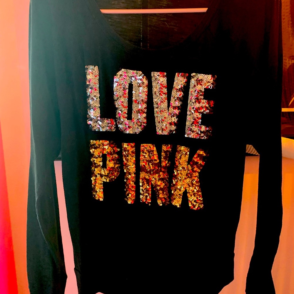 Pink brand long sleeved T-shirt with gold and silver sequins. Size is Small